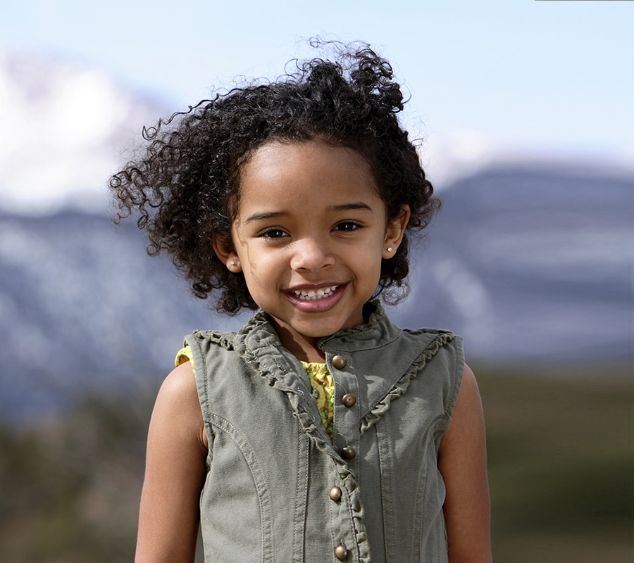 Girl smiling at Smile Arc Pediatric Dentistry in San Diego, CA