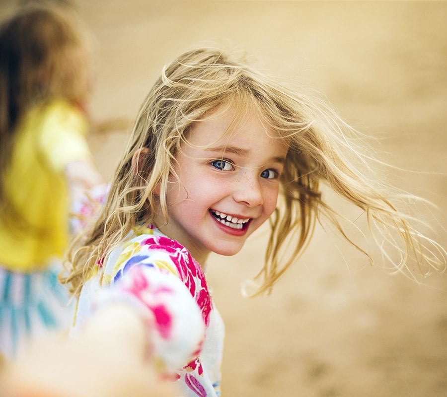 Girl smiling at Smile Arc Pediatric Dentistry in San Diego, CA