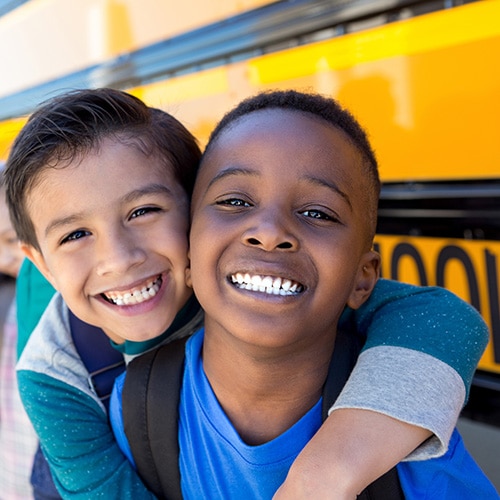 Friends Smiling at Smile Arc Pediatric Dentistry in San Diego, CA
